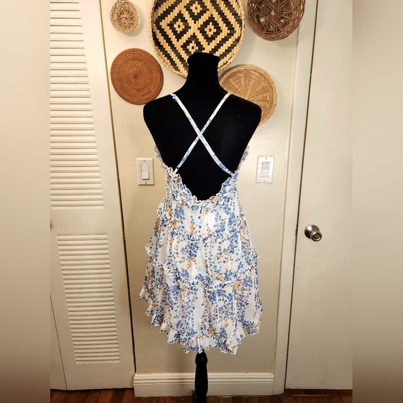 LAST ONE! Blue And White Floral Mini Dress With Ruffles And Criss-Cross Back - Picture 8 of 11